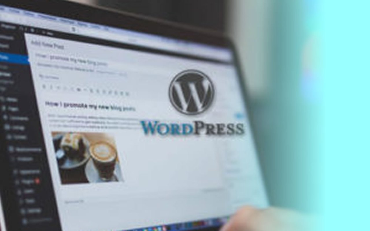 WordPress dashboard on a laptop screen during website design training